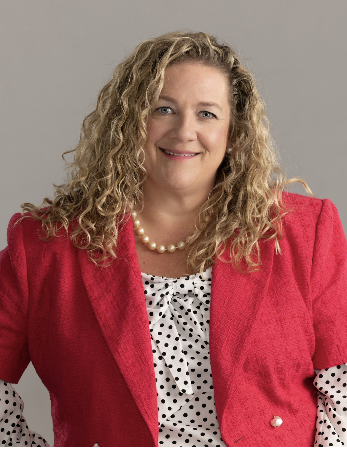 Lacey Sprague, Broker
